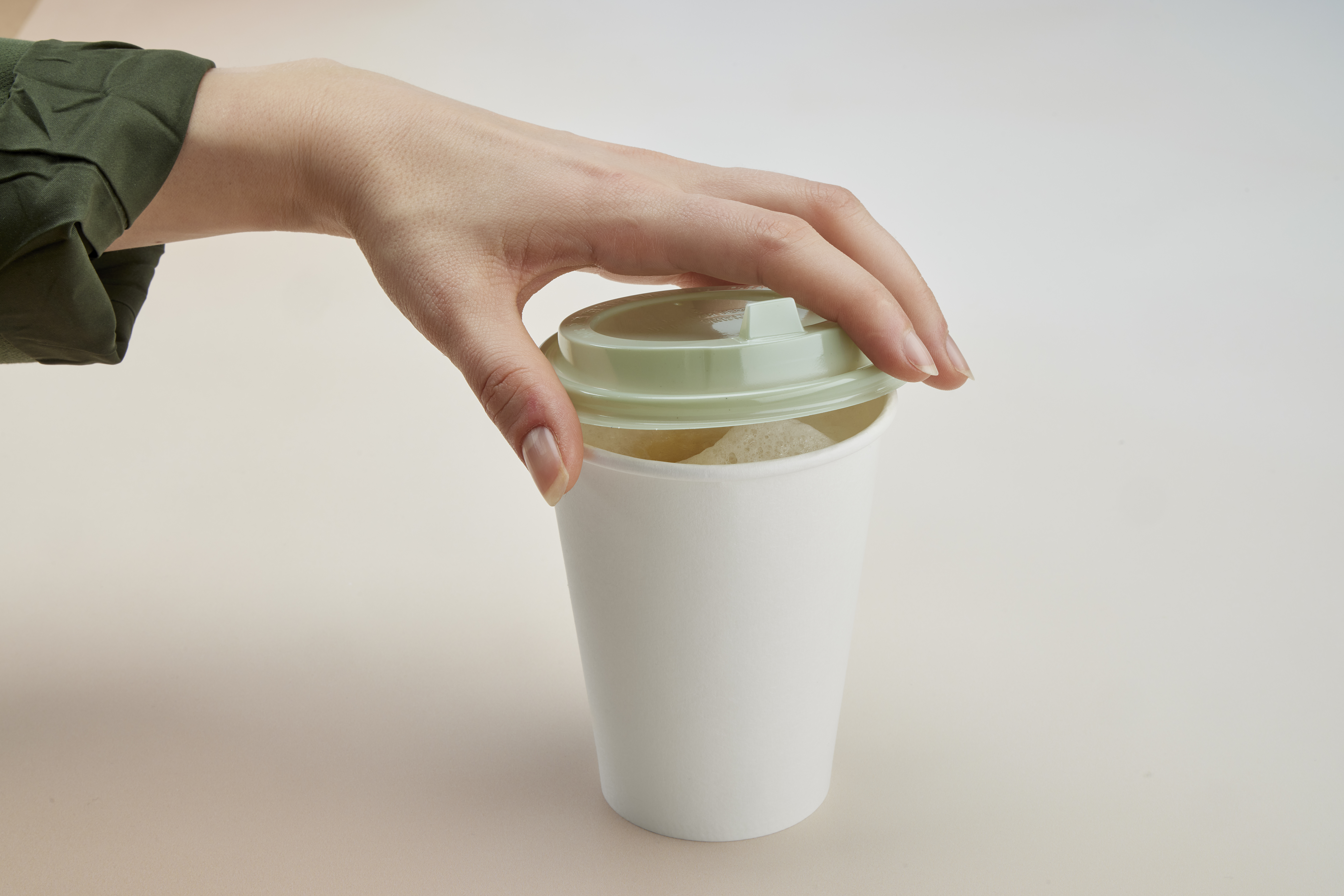 Evolve green PET hot cup lid