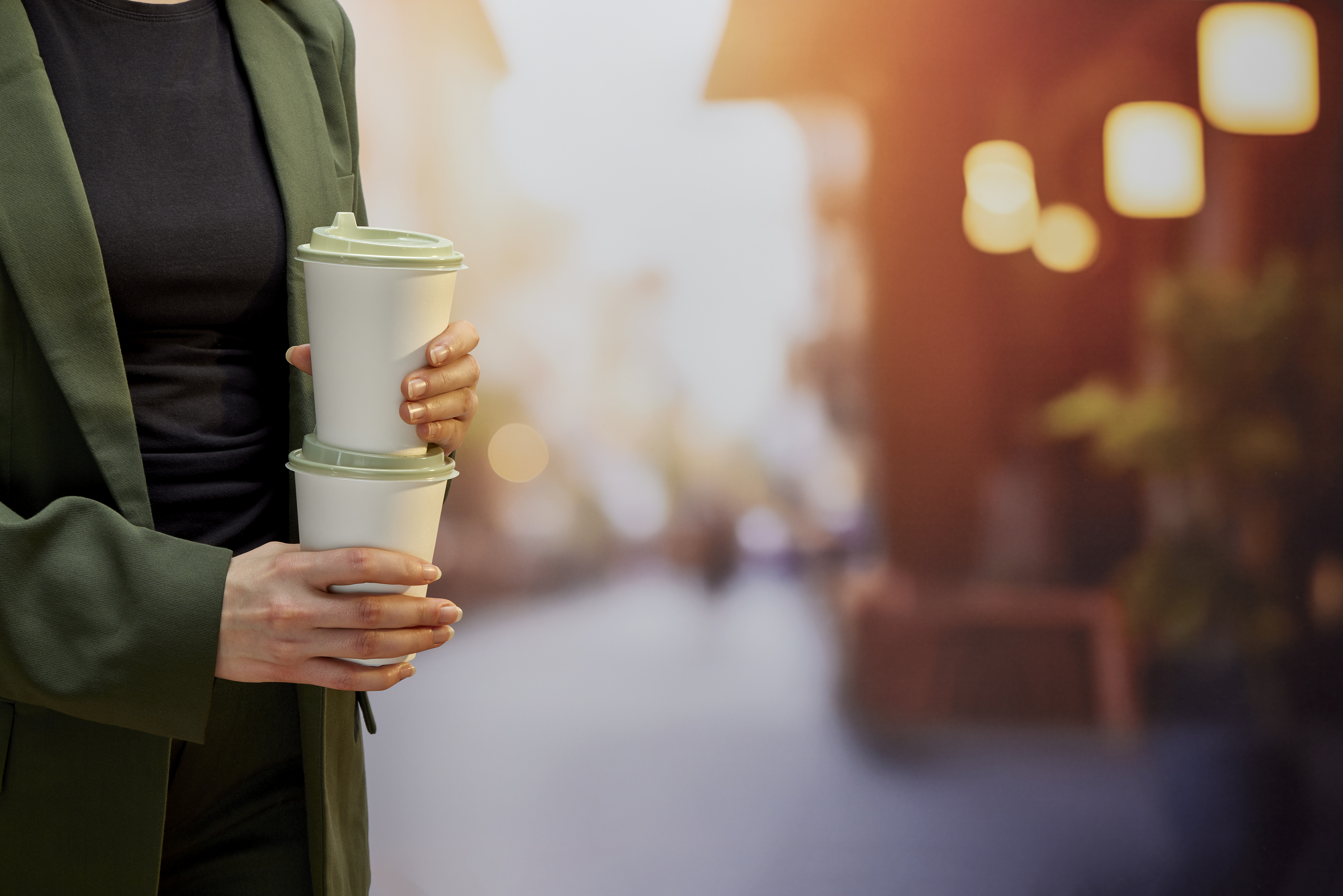 Evolve green PET hot cup lids